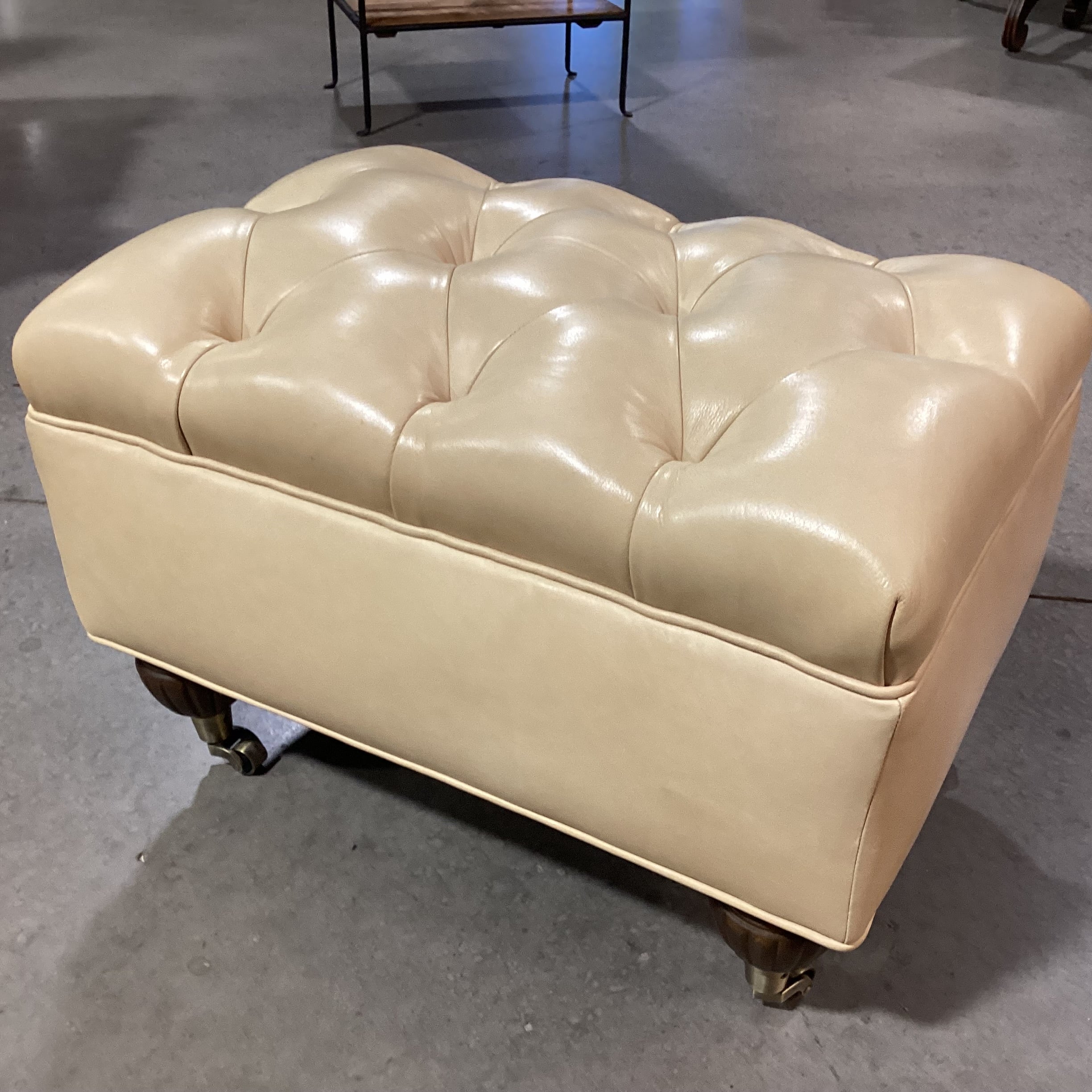 Blonde Leather Tufted Carved Wood & Caster Feet Ottoman 25"x 18"x 17"
