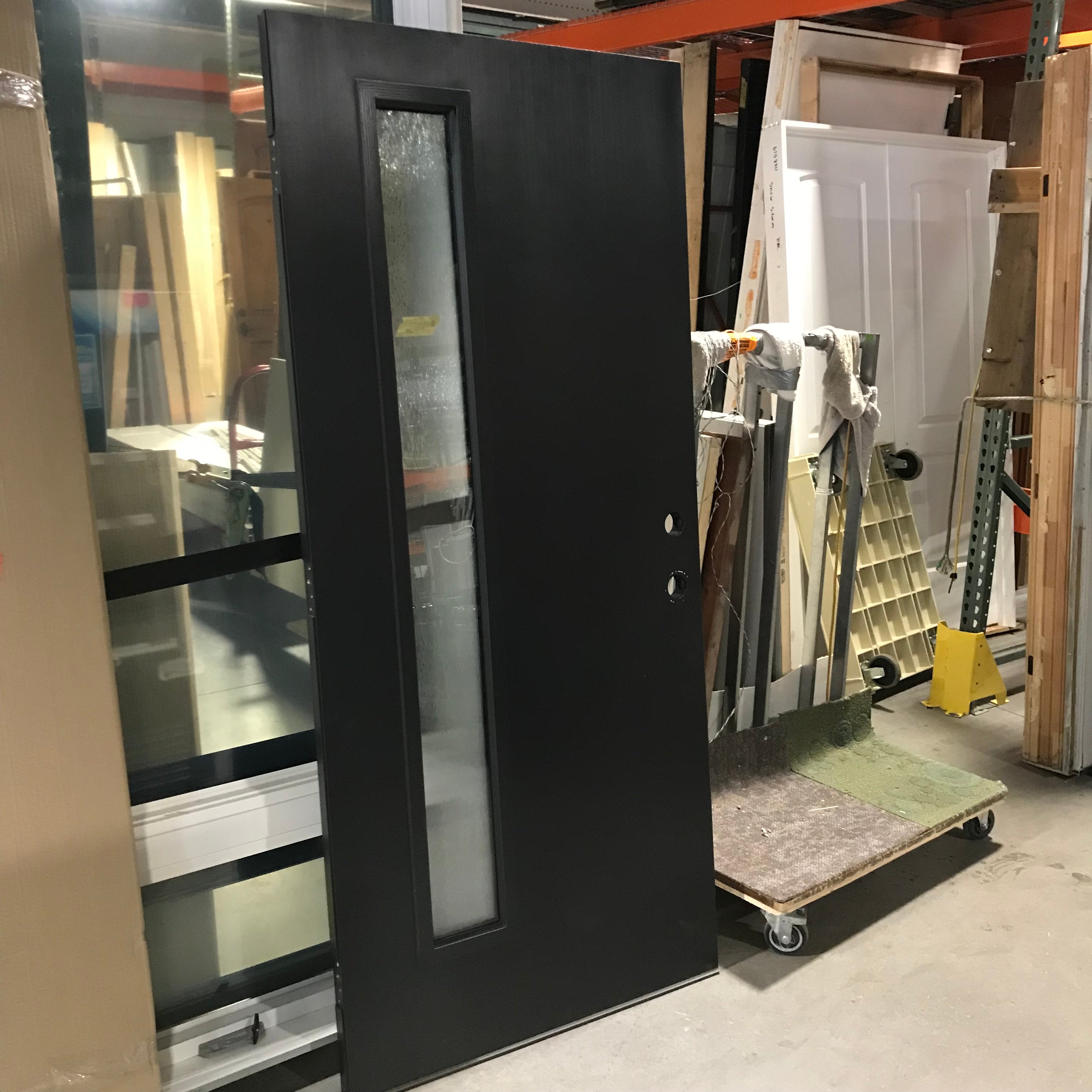 36"x 79"x 1.75" Black Composite Universal Swing with Frosted Lined Vertical Window Exterior Door
