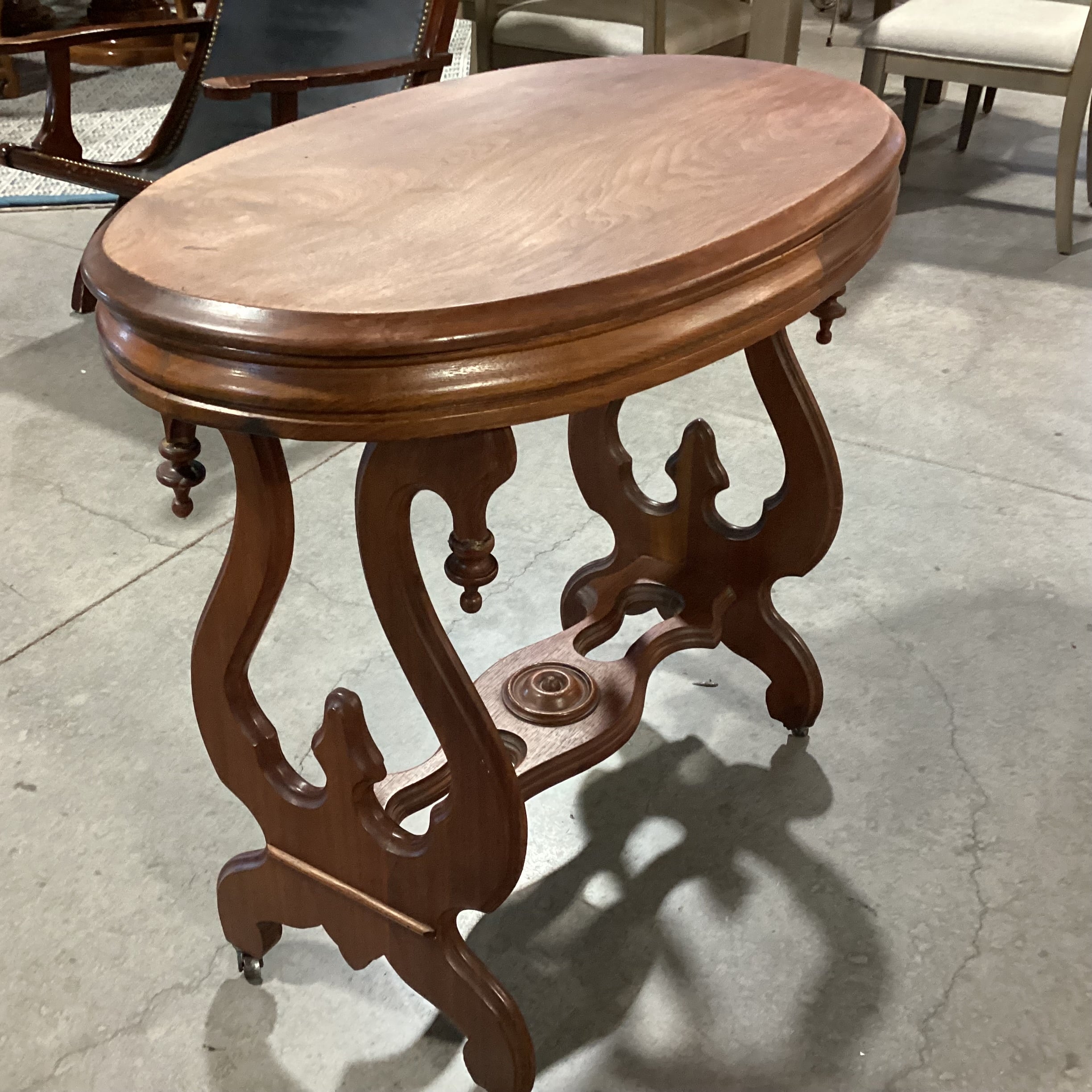 Antique Ornate Carved Sides & Trestle on Casters Oval Accent Table 33"x 19"x 30"