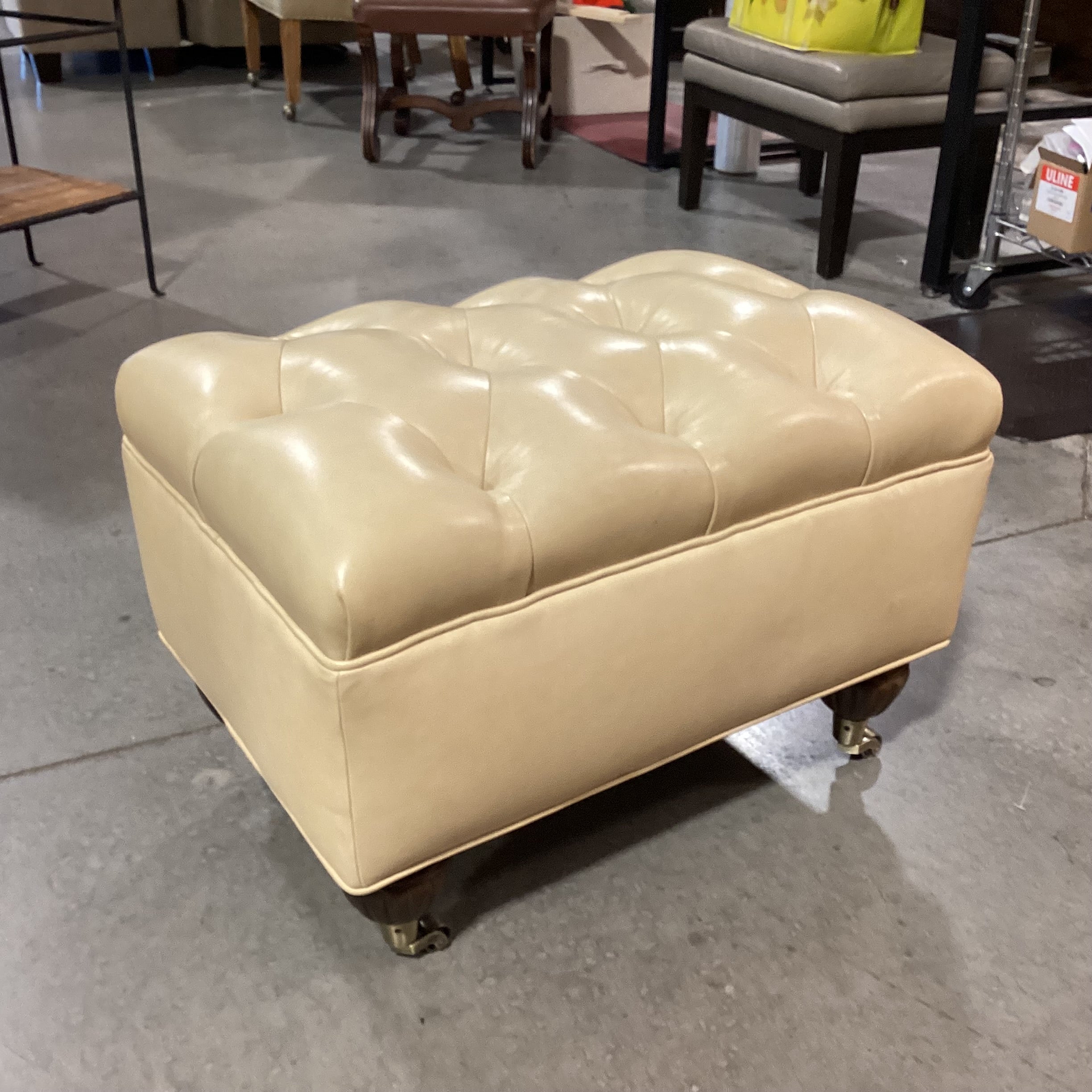 Blonde Leather Tufted Carved Wood & Caster Feet Ottoman 25"x 18"x 17"