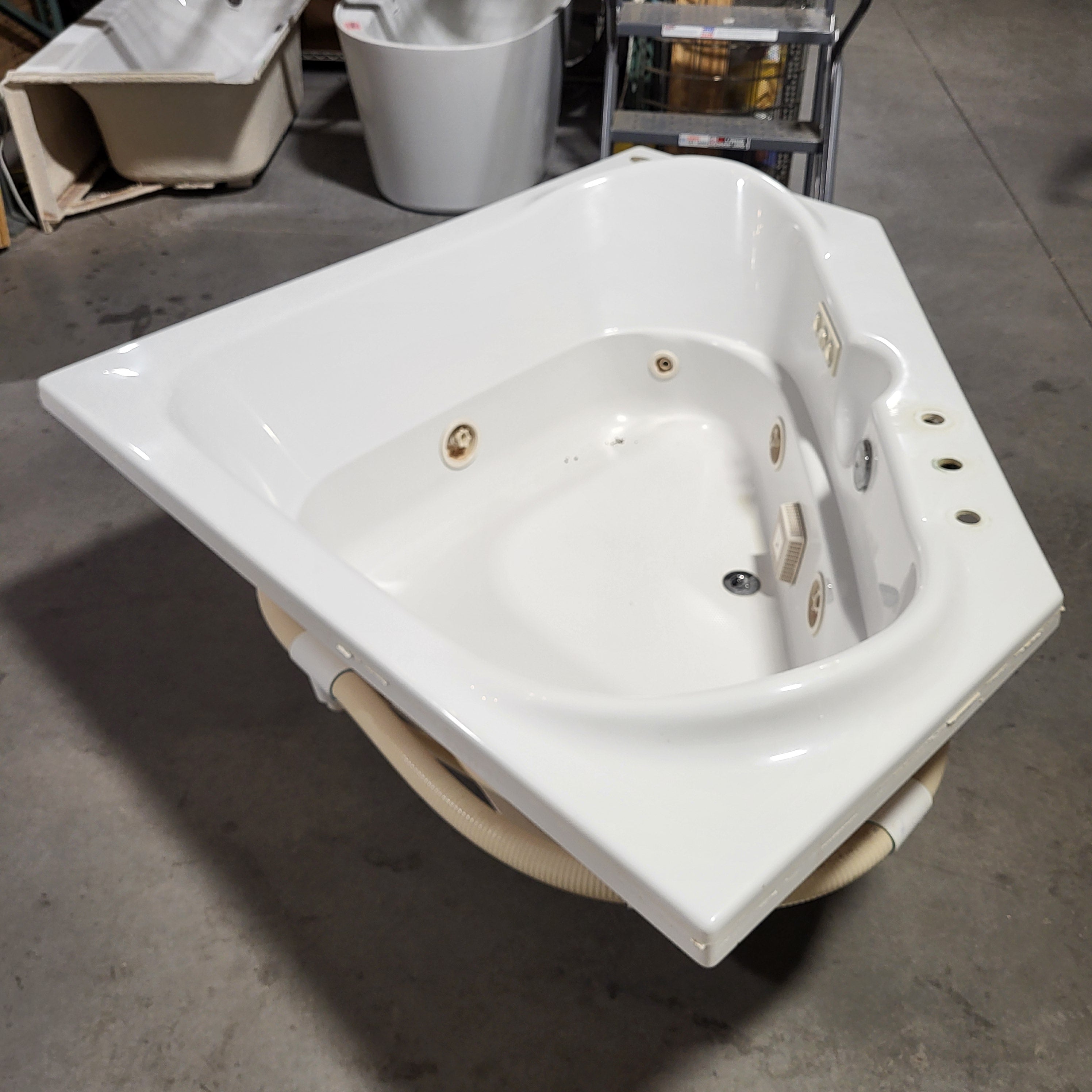 85"x 60"x 19.5" Jacuzzi White Jetted Corner Tub