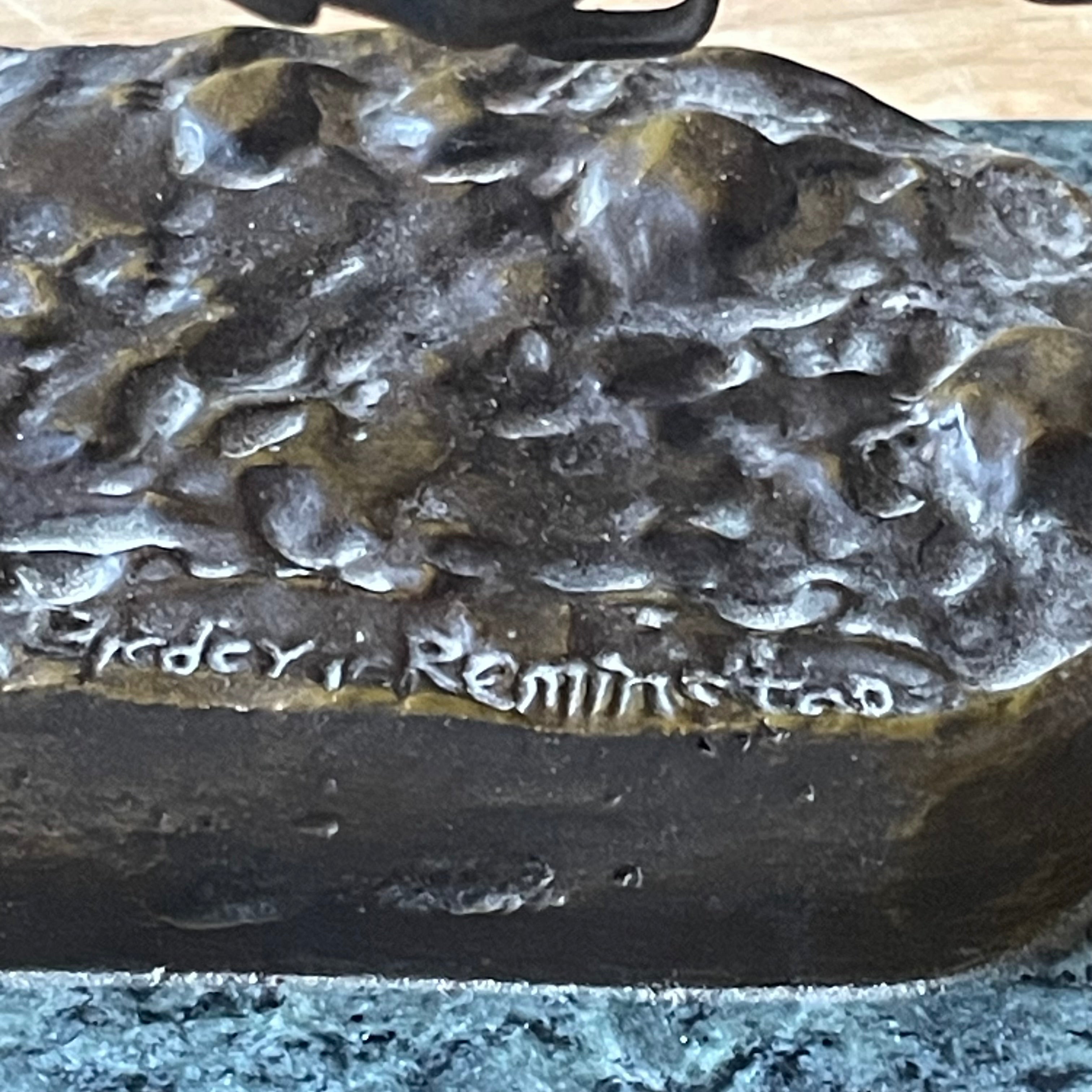 Frederic Remington Bronze Reproduction of "The Bronco Buster" on Green Marble Base, 12"x 8"x 8.75"