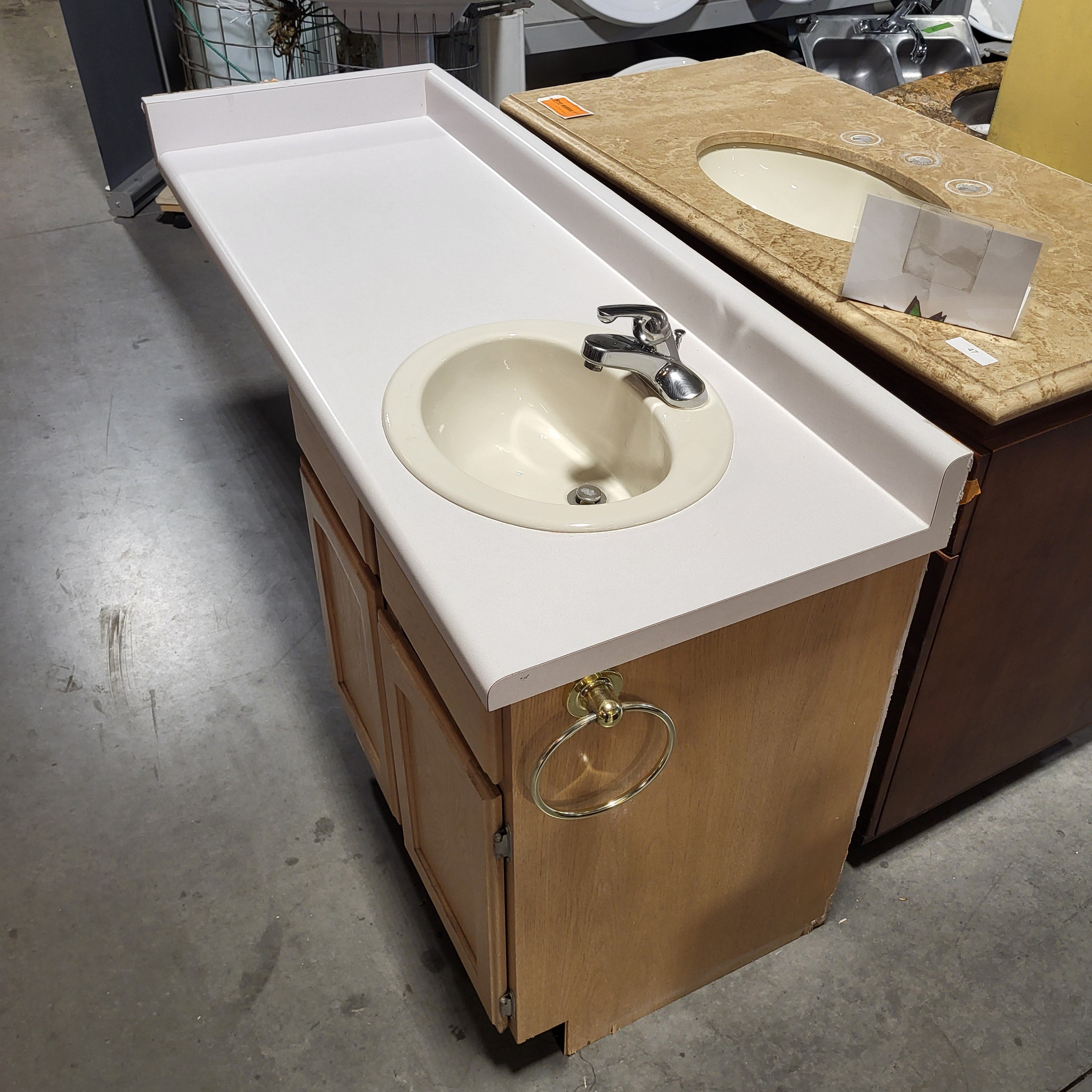 61"x 22.25"x 36"  Light Oak Base With Long Laminate Top Sink And Faucet Vanity