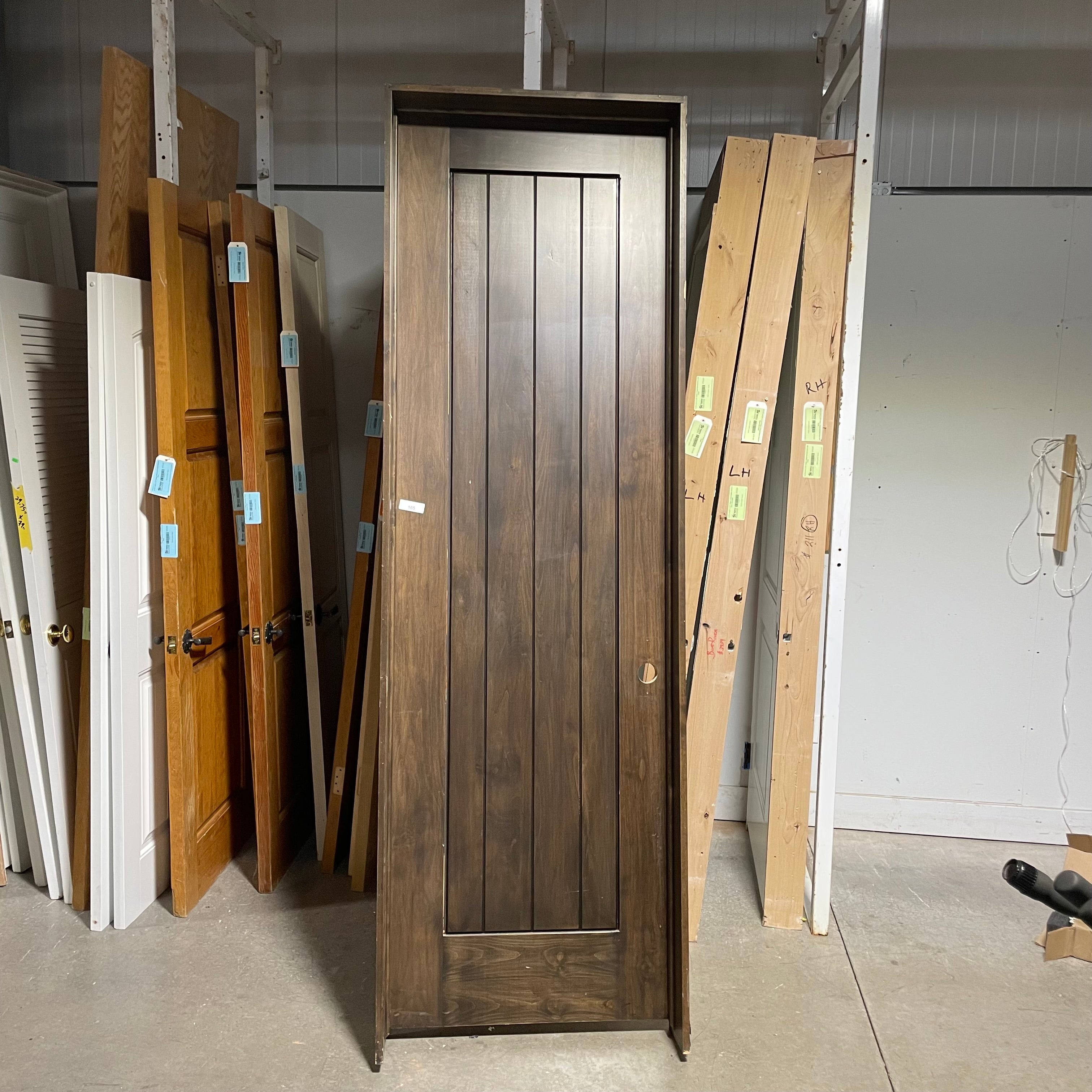 29.75"x 96"x 1.75" Rough Opening is 31.5"x 98.5"x 6.75" Brown Vertical Lined Walnut Interior Door with Jamb