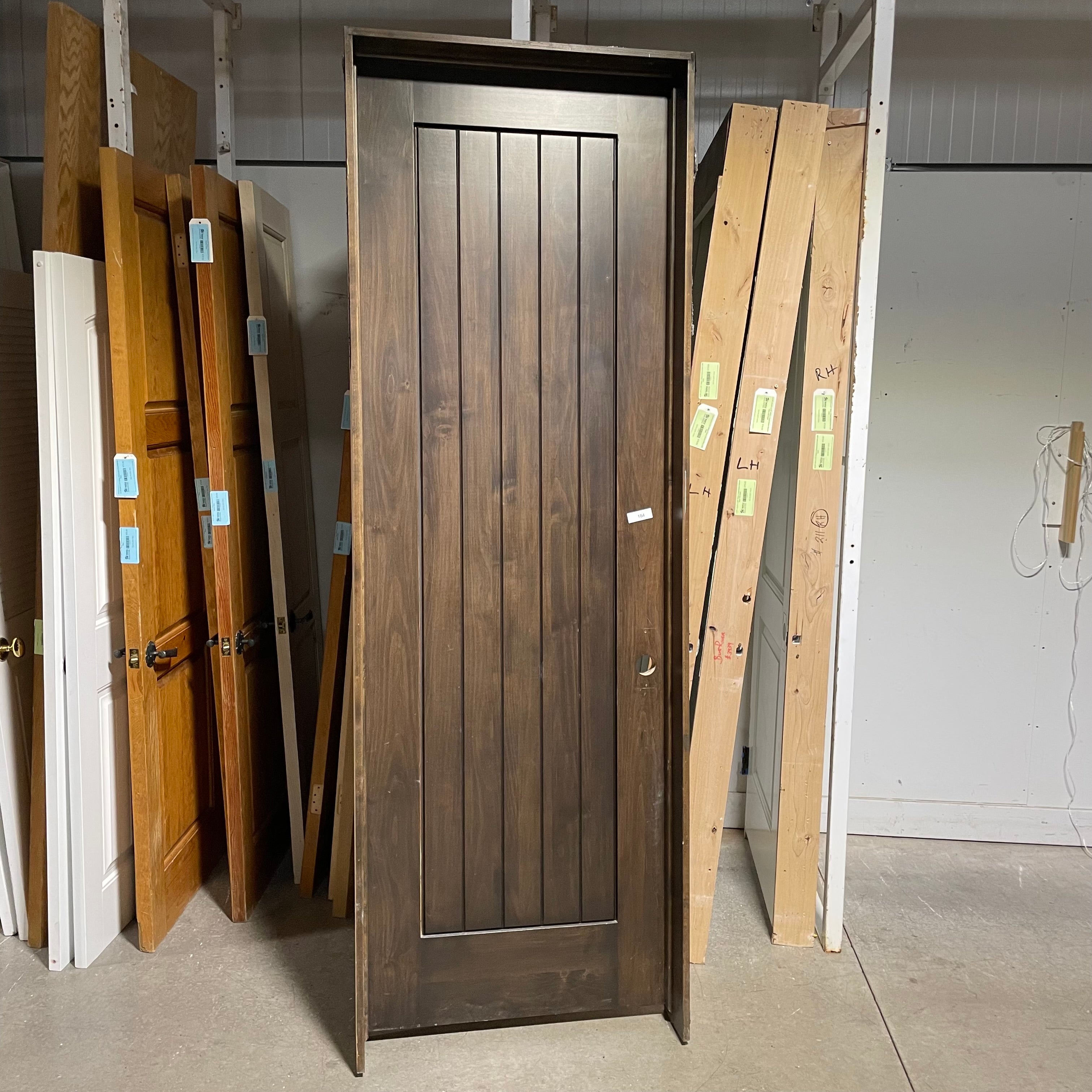 31.75"x 96"x 1.75" Rough Opening is 33.25"x 98.25"x 6.75" Brown Vertical Lined Walnut Interior Door with Jamb