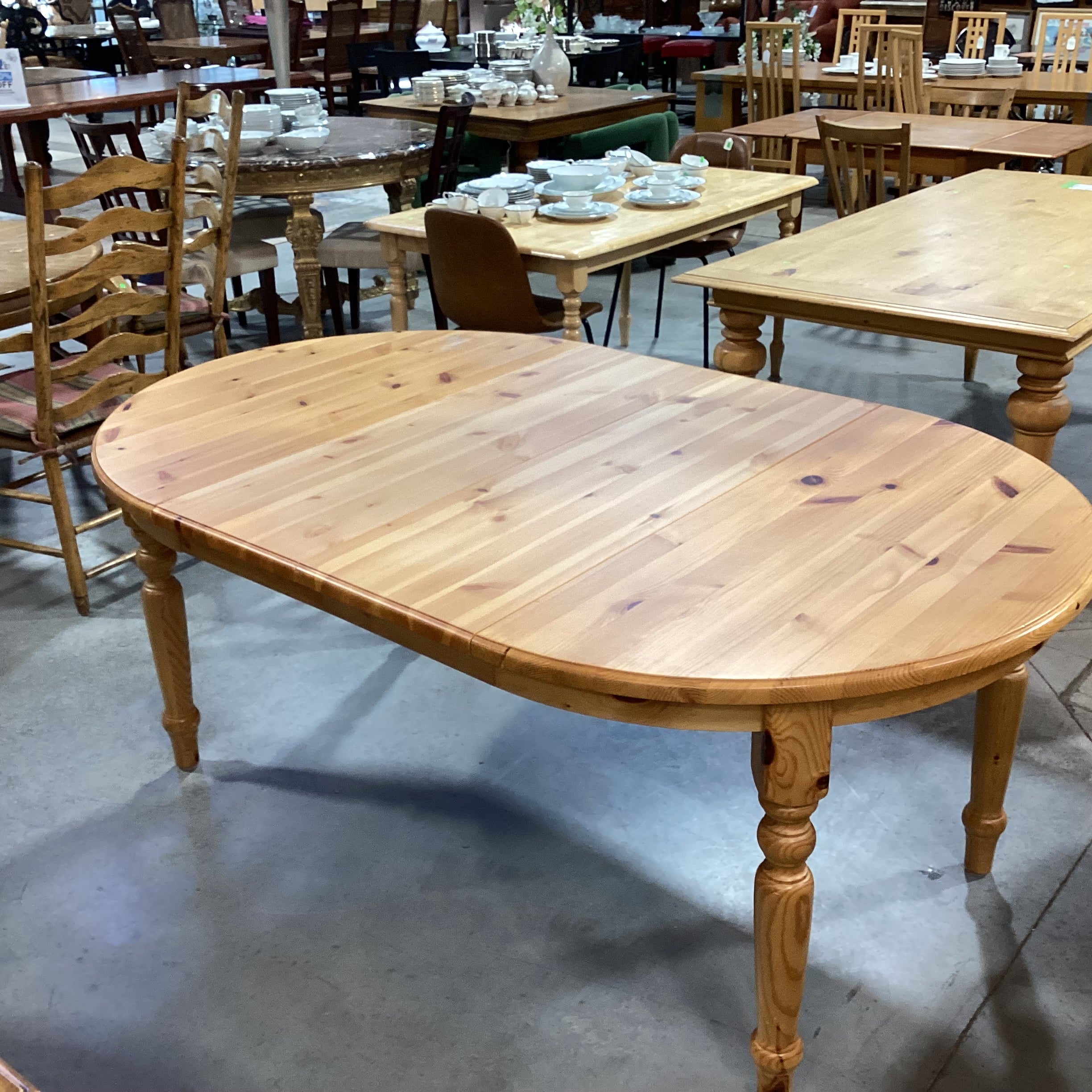 Natural Pine Round to Oval with 2 Leaves Dining Table 45" to 72.5"x 30"