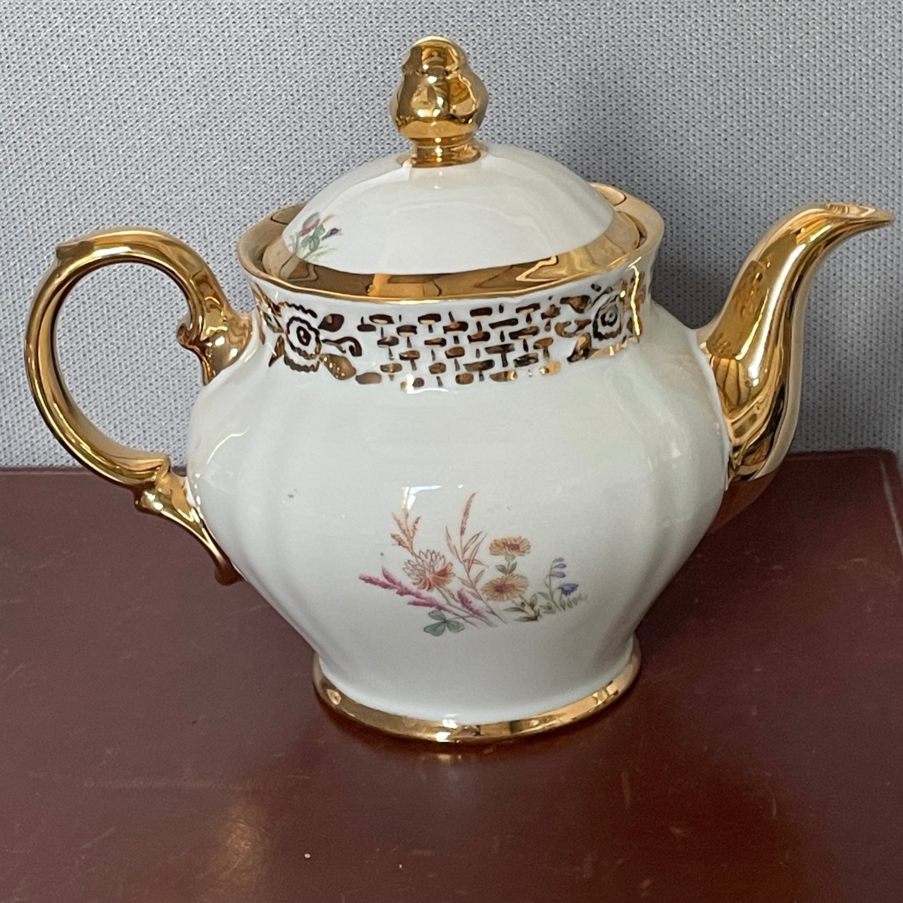 Set of 17 Pieces Oscar Schaller/Winterling Bavarian Gold/White Floral Porcelain Tea Set