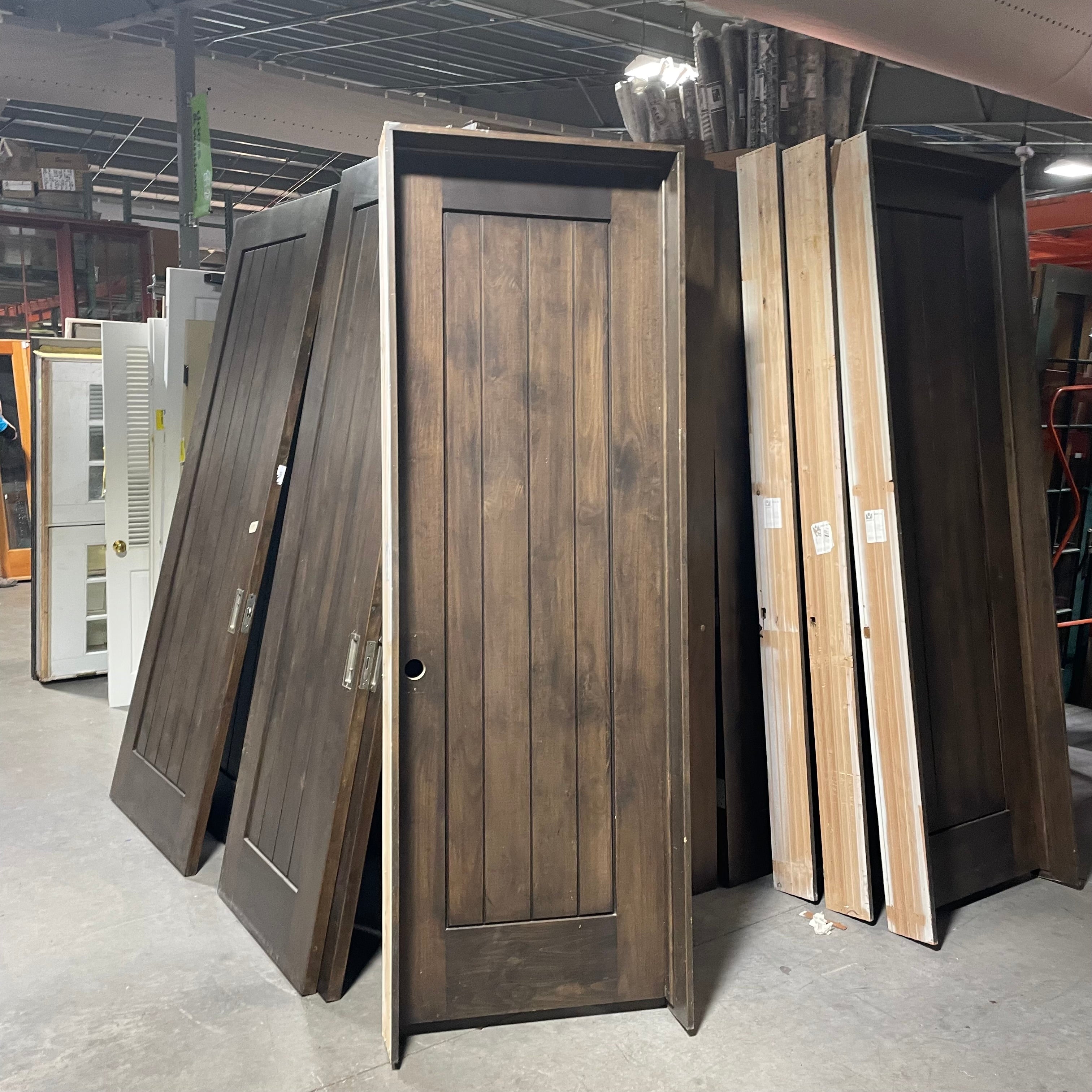 29.75"x 90"x 6.75" Rough Opening is 31.25"x 92.25"x 6.75" Brown Vertical Lined Walnut Interior Door with Jamb