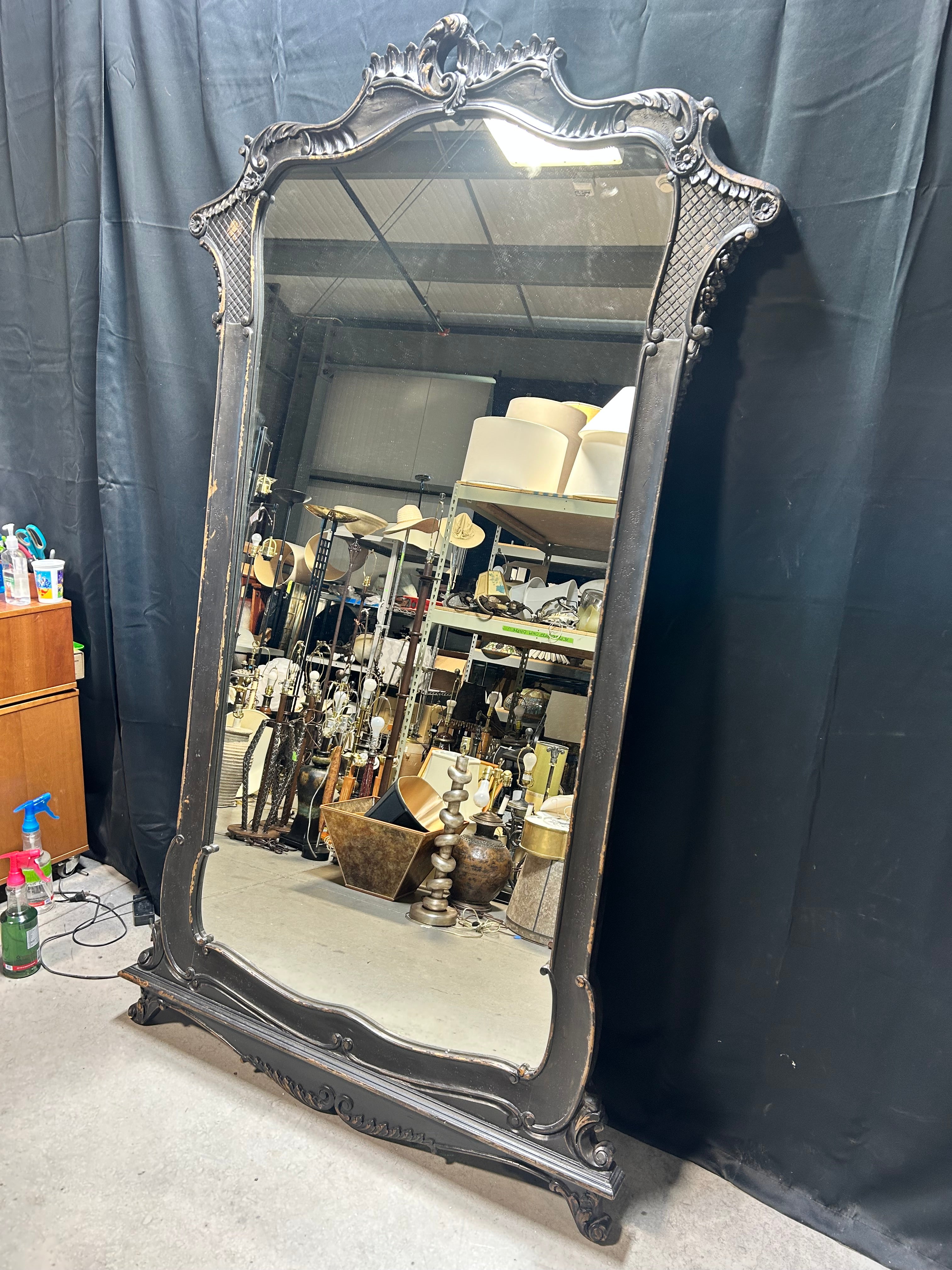 A French Louis XV Style Ornate Carved Blackened Finish 47.5"x 84" Mirror
