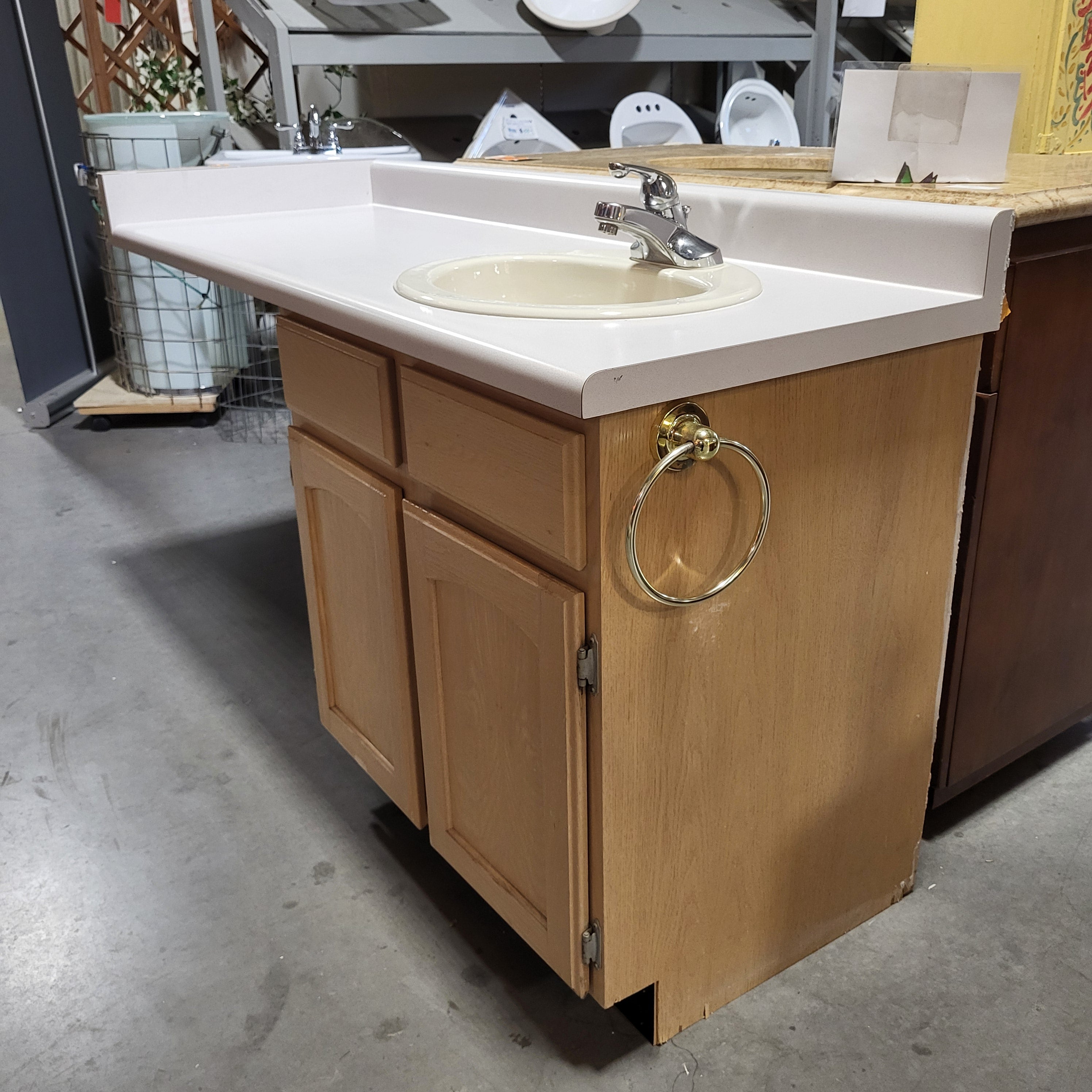 61"x 22.25"x 36"  Light Oak Base With Long Laminate Top Sink And Faucet Vanity