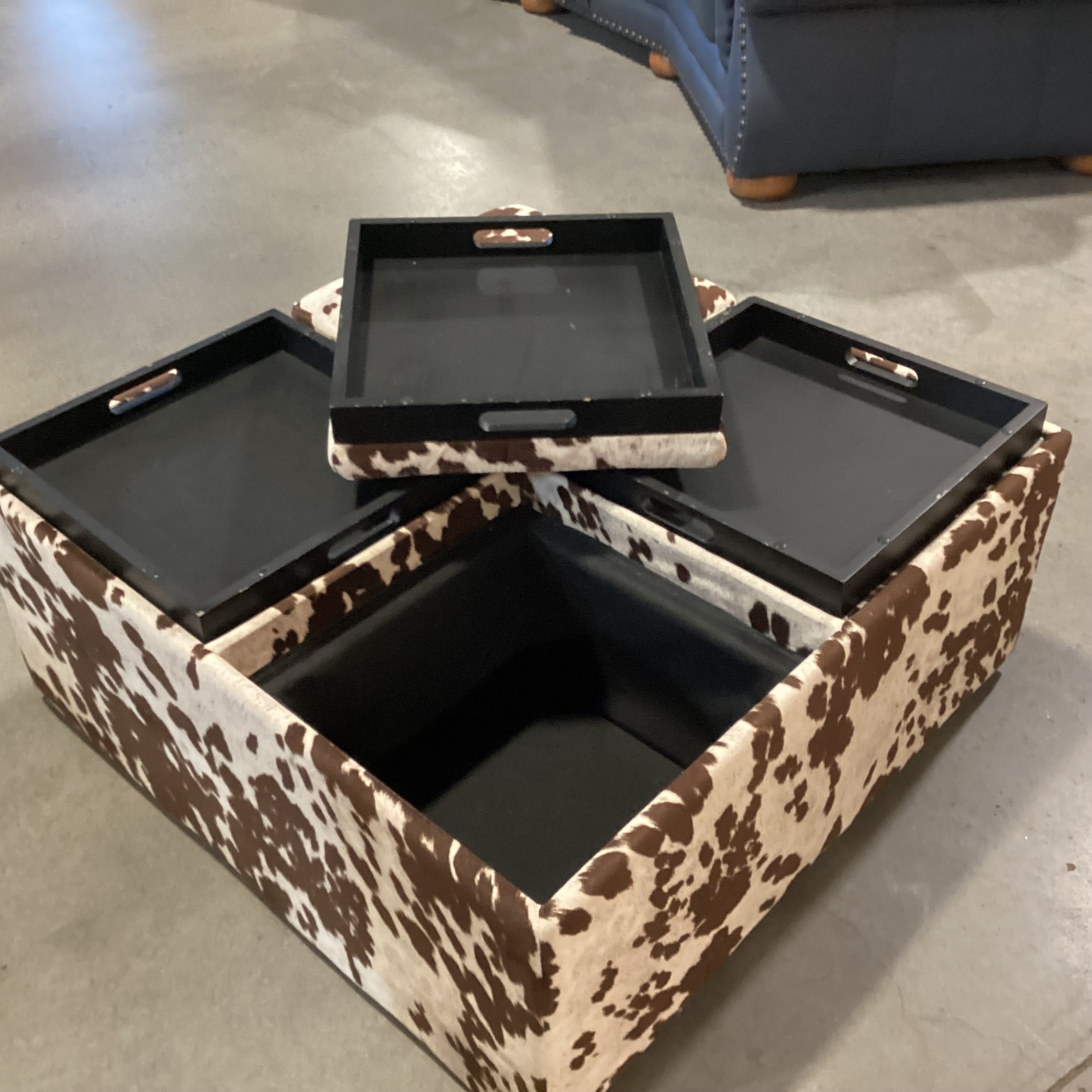 Faux Cowhide 4 Section Storage with Flip Top Tray Cocktail Ottoman 36"x 36"x 16"
