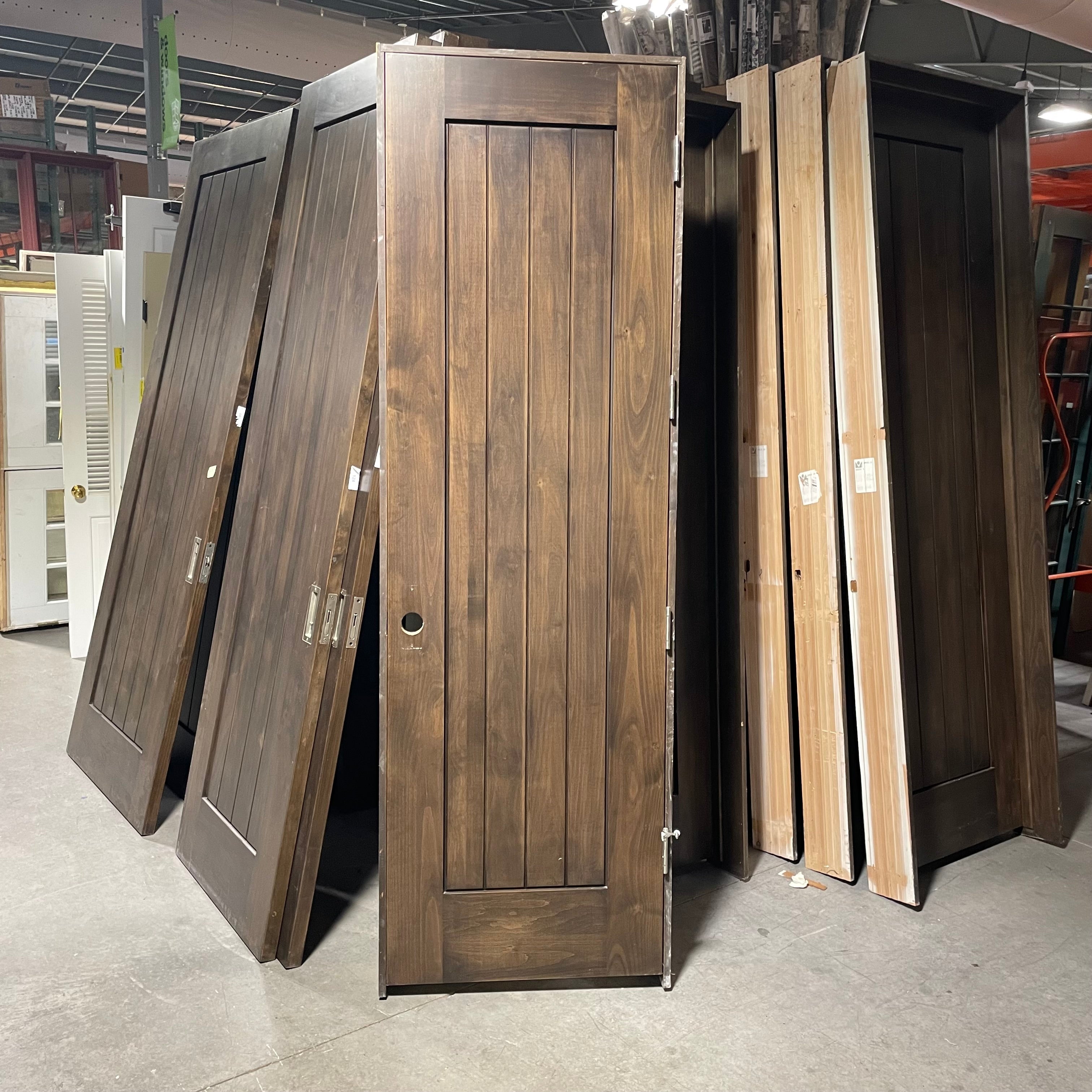 27.75"x 90"x 1.75" Rough Opening is 29.5"x 92.25"x 6.75" Brown Vertical Lined Interior Door with Jamb