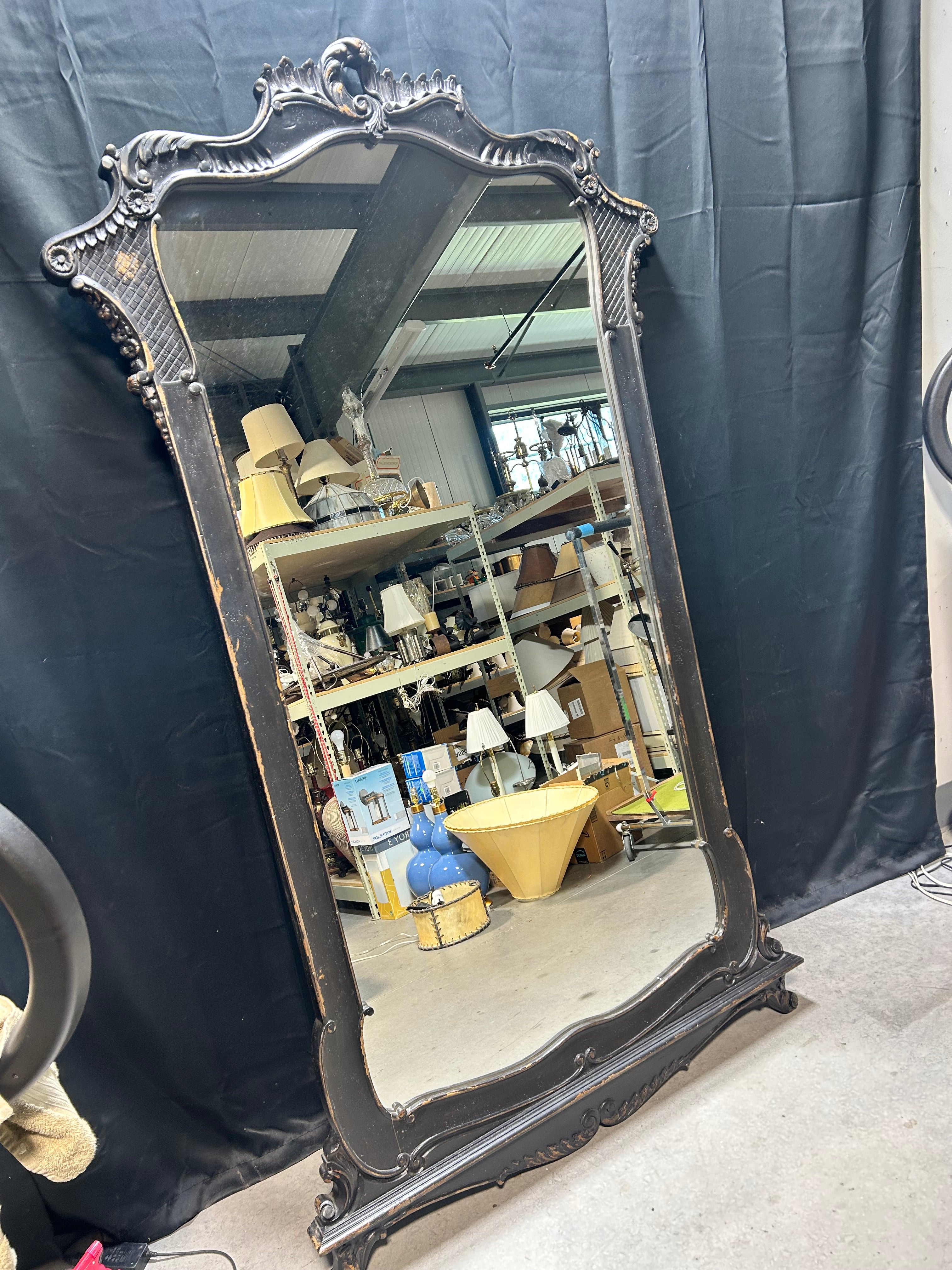 A French Louis XV Style Ornate Carved Blackened Finish 47.5"x 84" Mirror