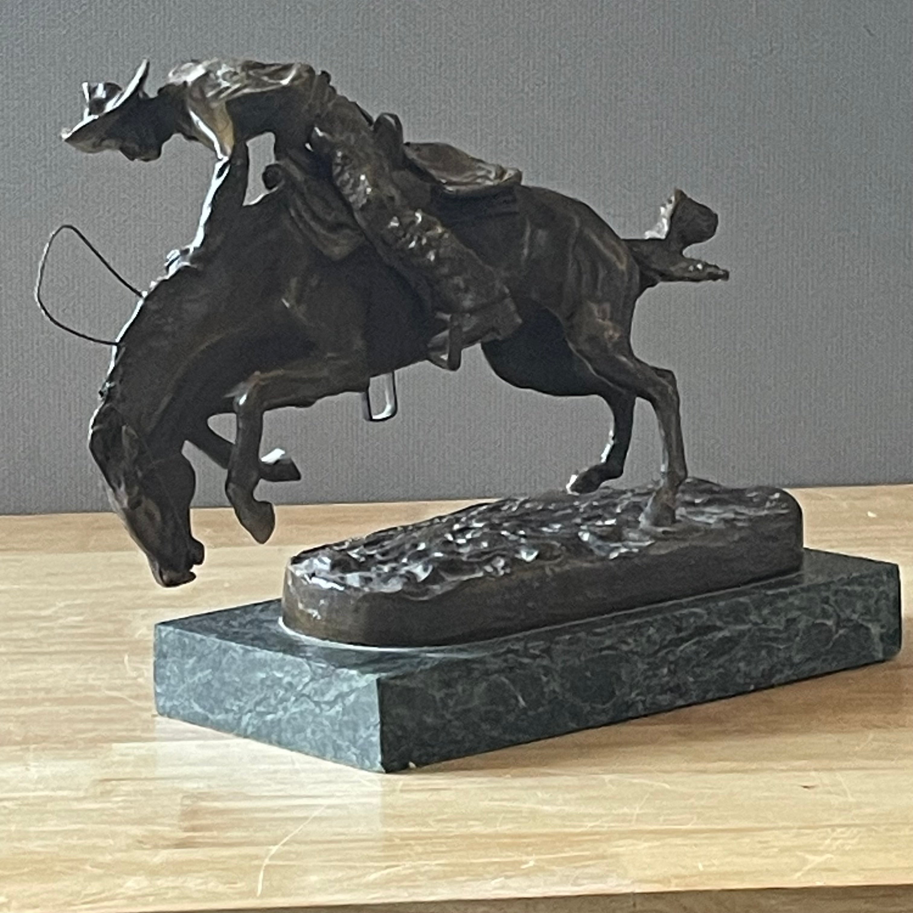 Frederic Remington Bronze Reproduction of "The Bronco Buster" on Green Marble Base, 12"x 8"x 8.75"