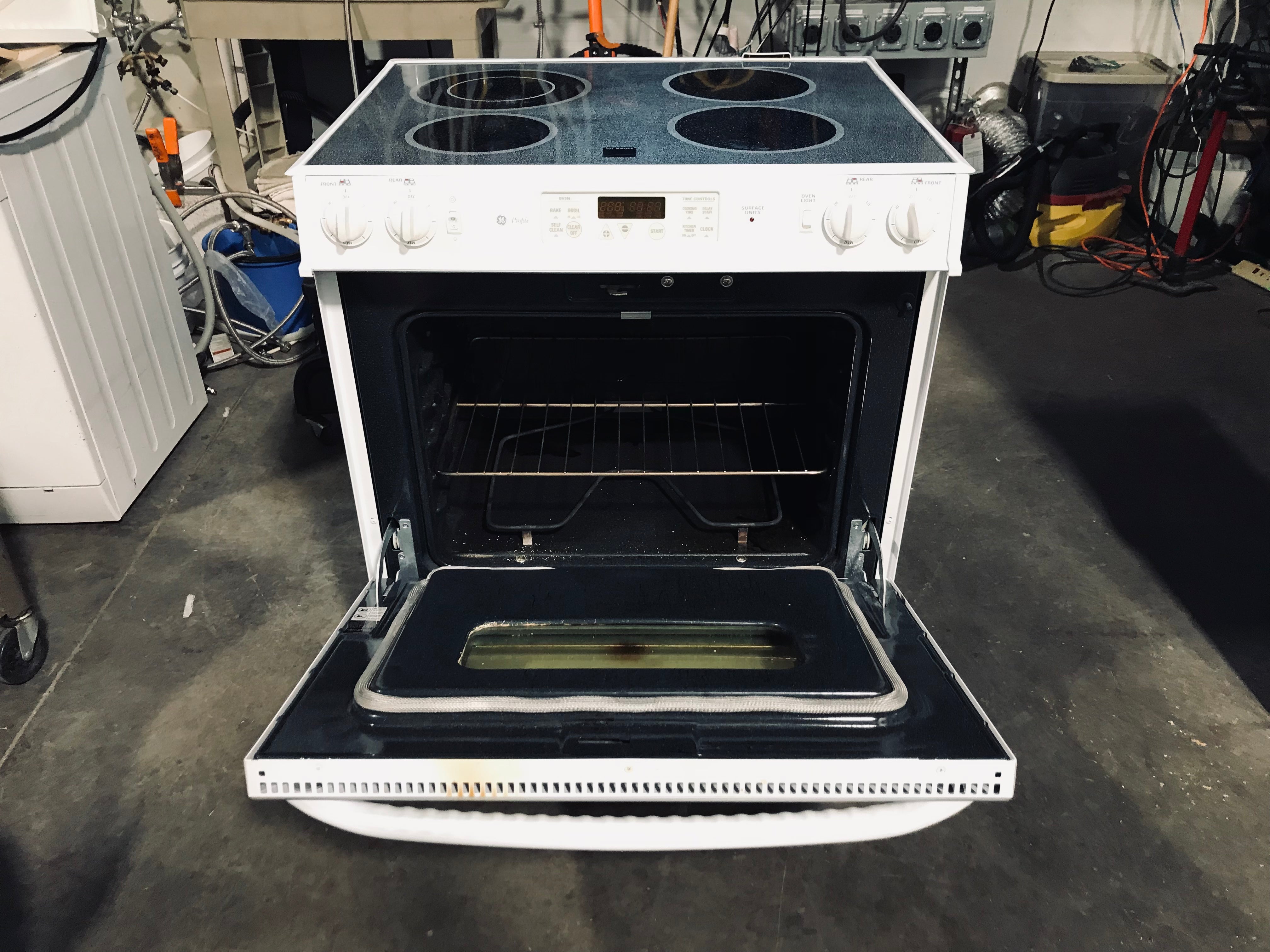 GE Profile White 4-Burner, Glass-Top Electric Range 31"x 26"x 36"