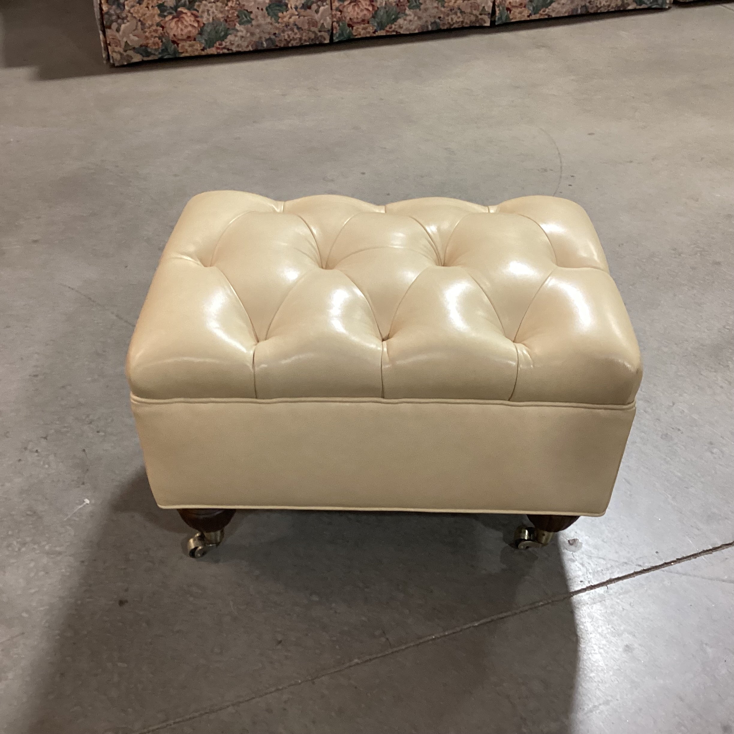 Blonde Leather Tufted Carved Wood & Caster Feet Ottoman 25"x 18"x 17"