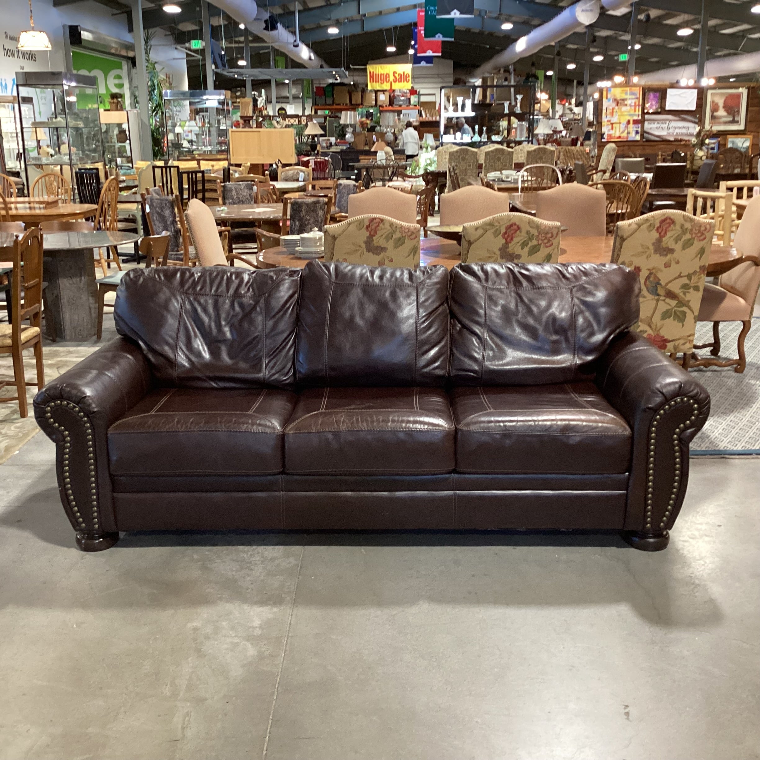 Ashley Furniture Dark Brown Leather Nailhead Roll Arm Sofa 99"x 41"x 38"