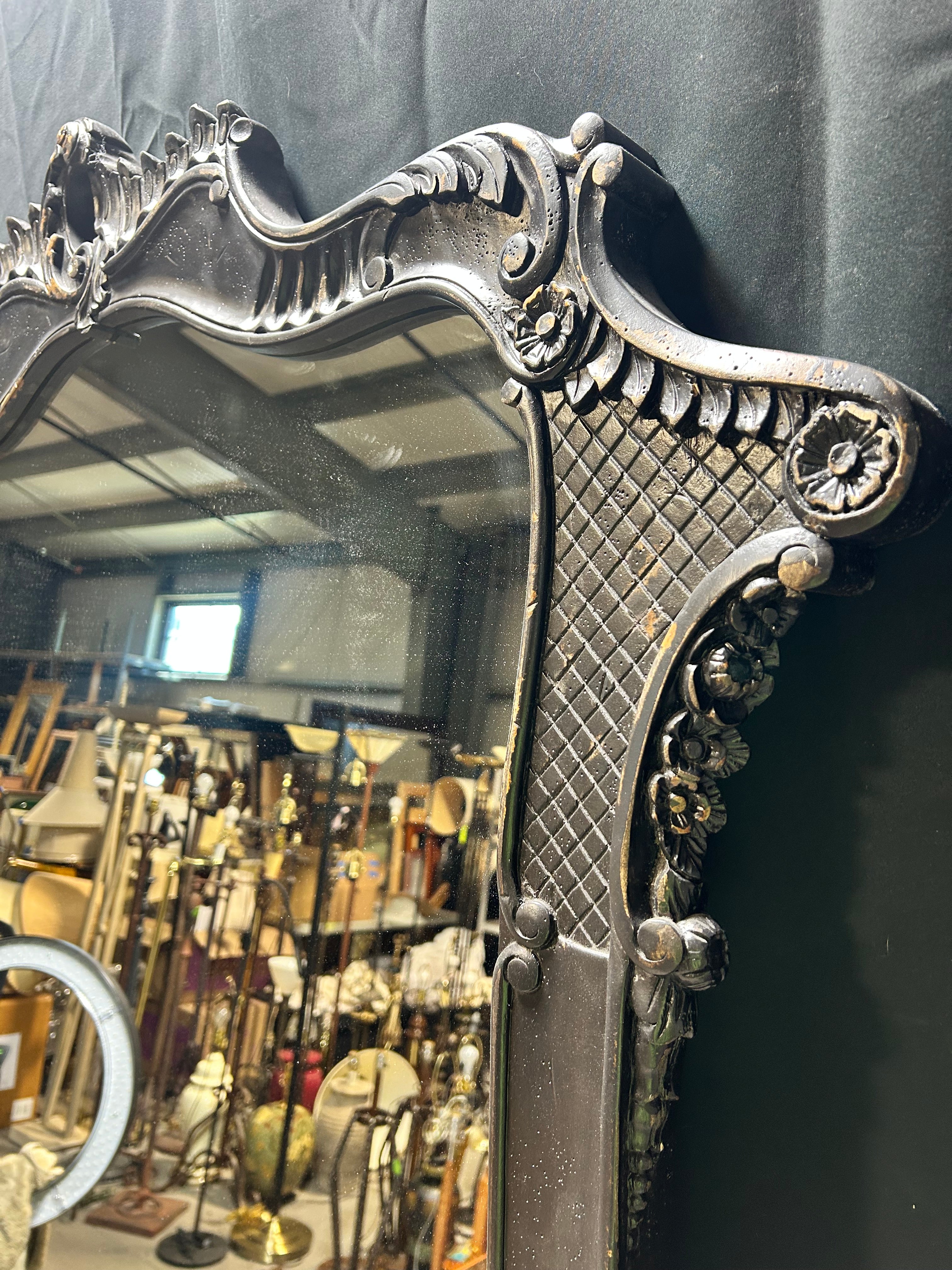 A French Louis XV Style Ornate Carved Blackened Finish 47.5"x 84" Mirror