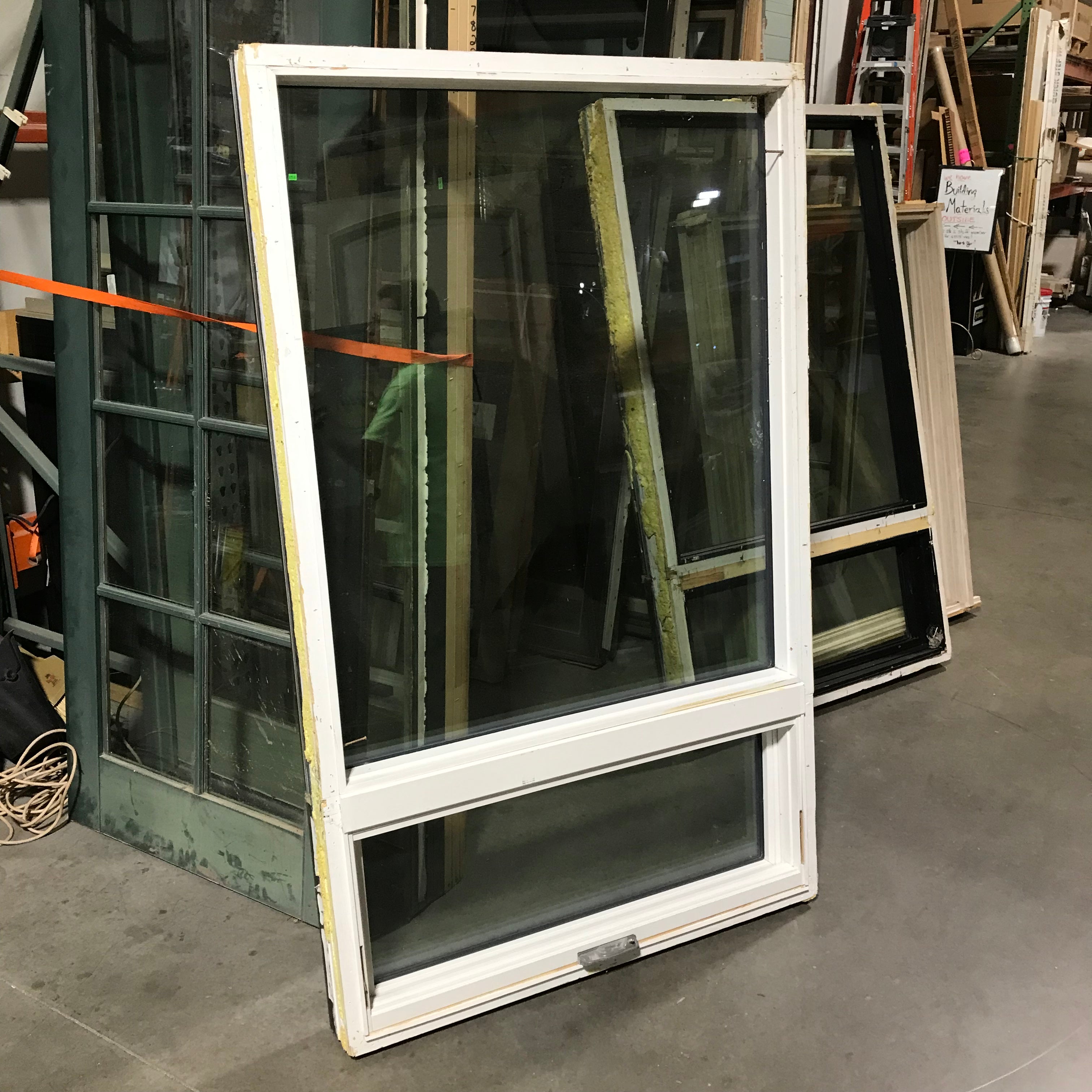 Brown Metal Clad Fixed Upper Window Canopy Lower Casement Exterior Window